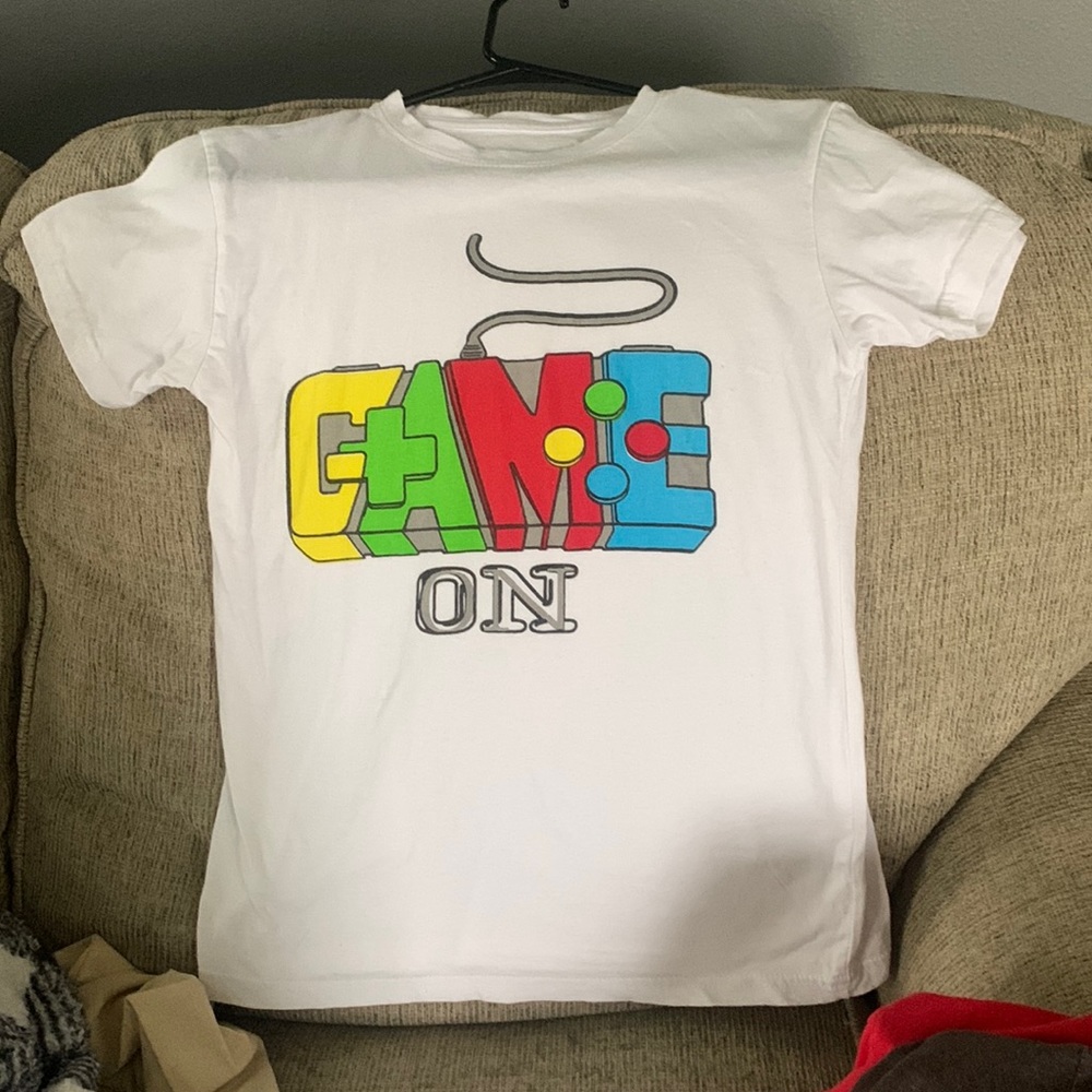 Youth white “Game On” tee. Size 18/20